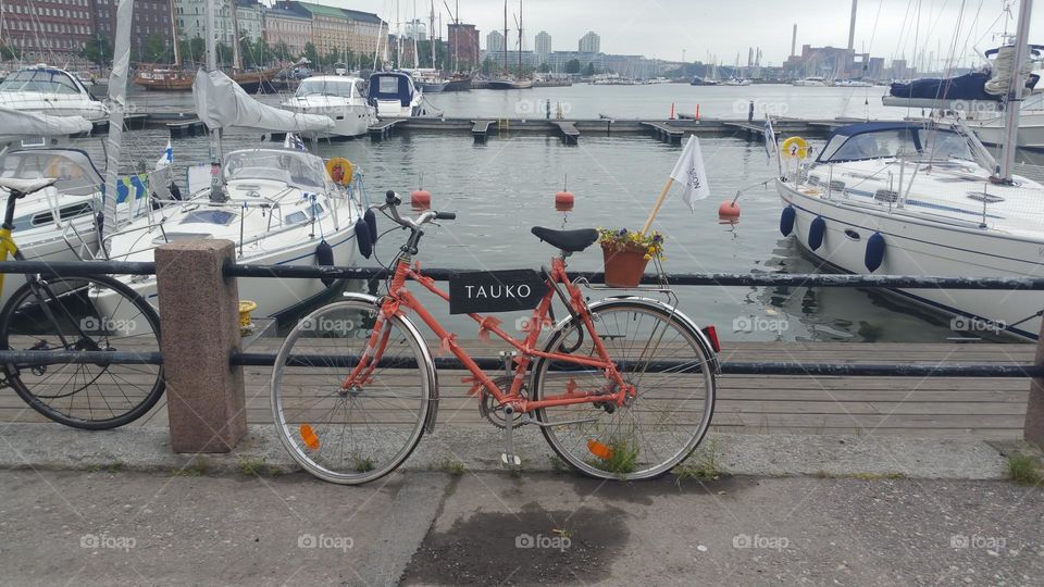 A cute bicycle next to the port of Helsinki.