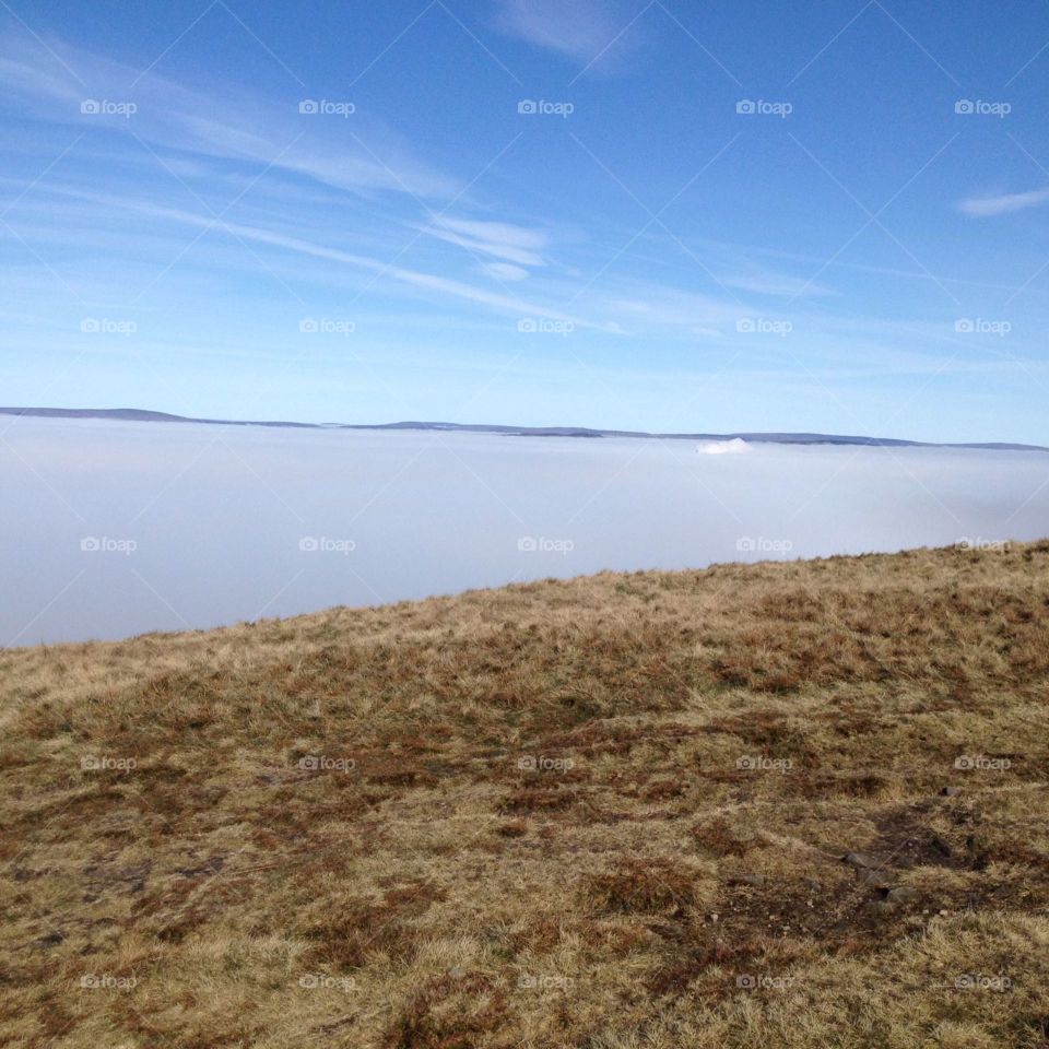 Standing above the clouds on Pendle Hill