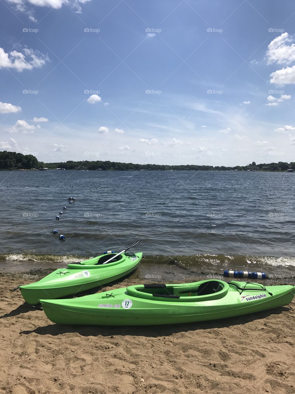 Kayaks waiting to go back across the lake
