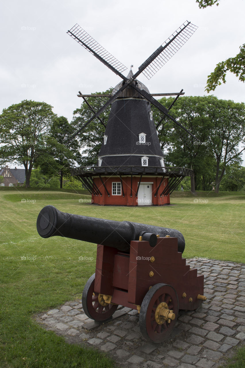 Old windmill and cannon