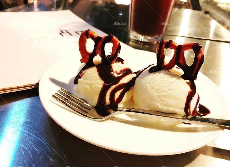 vanilla ice cream with chocolate toppings