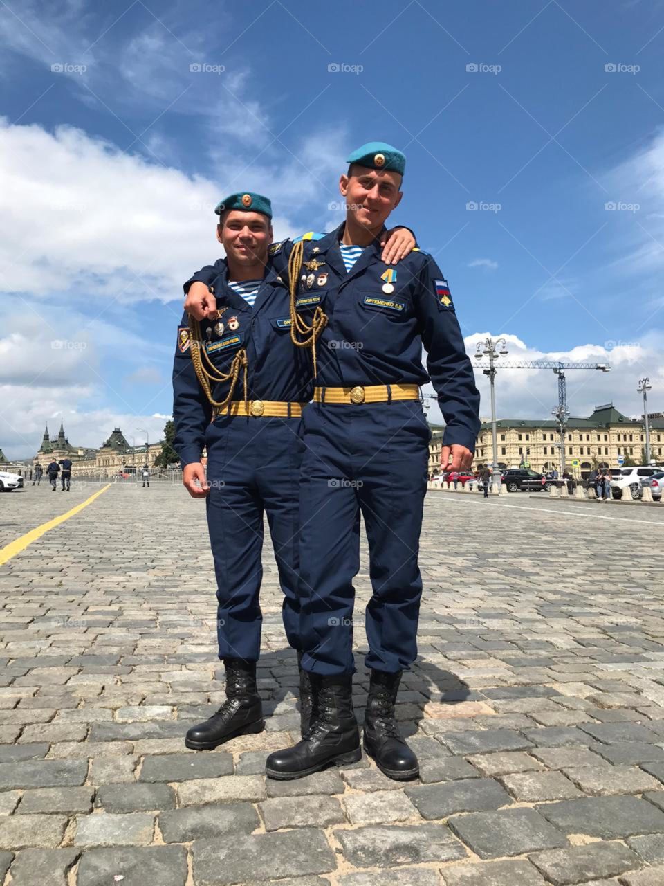 Young men in uniform in red square