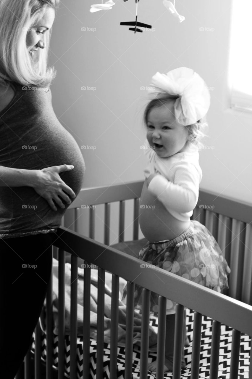 Expecting mother with toddler