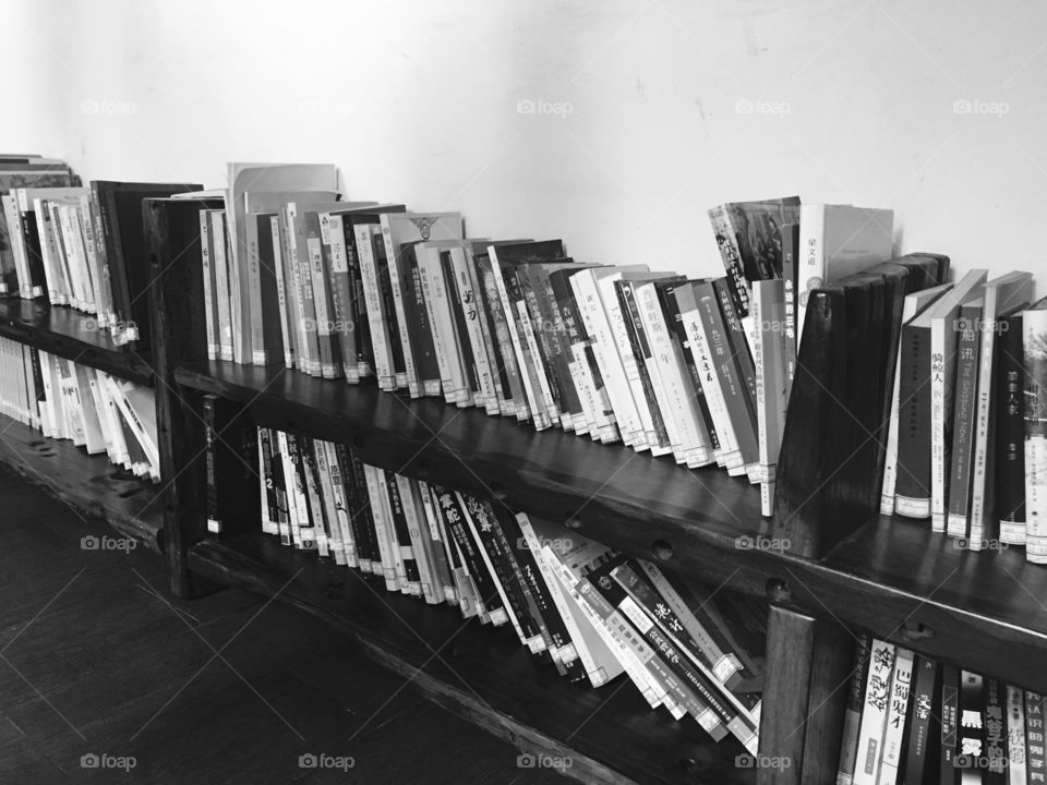Chinese Books on Wooden Shelf in Art Gallery at Dafen Oil Painting Village - Shenzhen, China