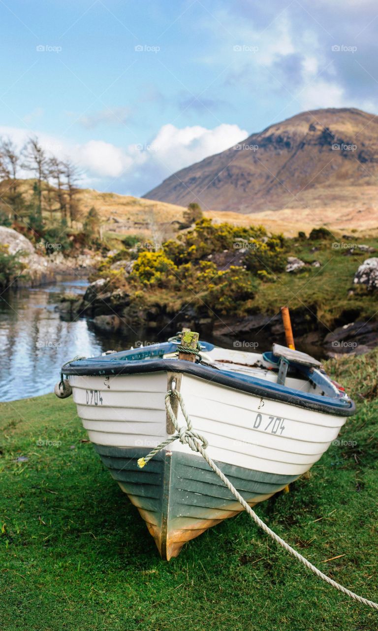 Boat placed near a river shore
