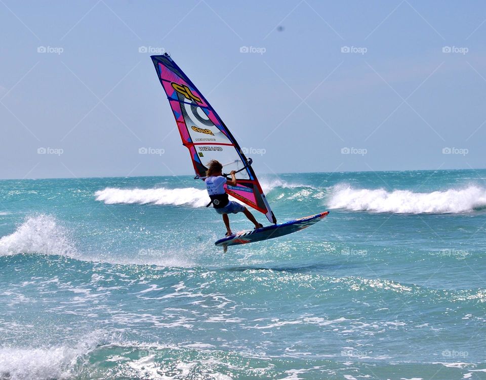 Windsurfing on wave