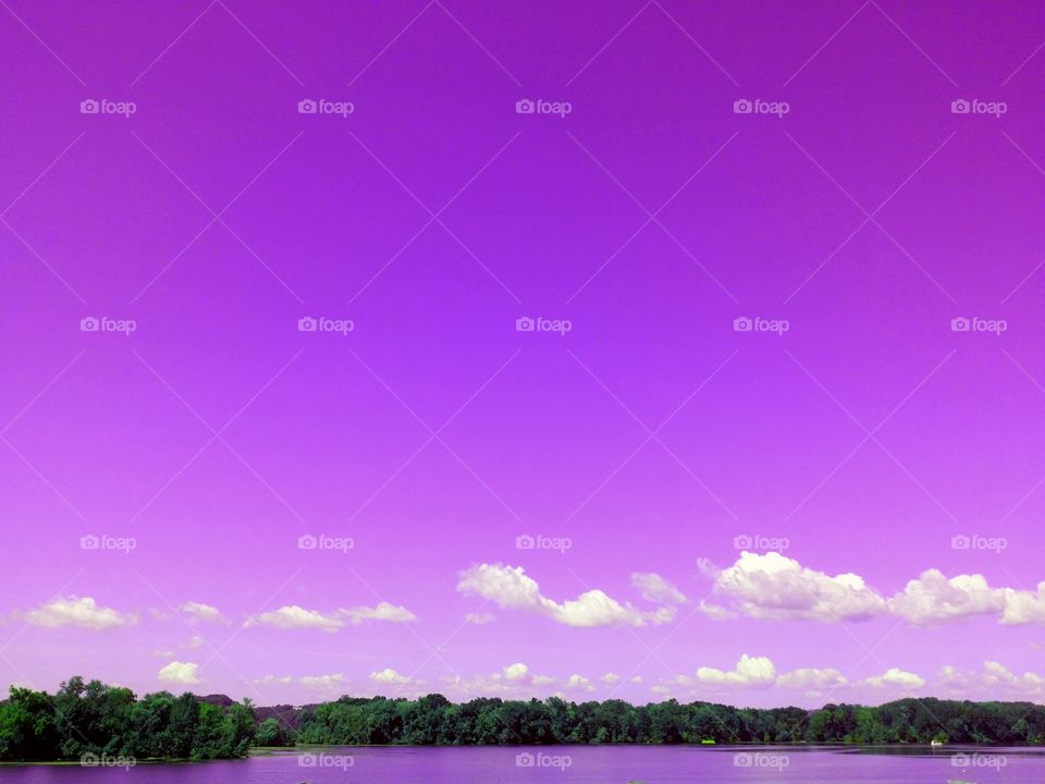 View of lake with purple sky