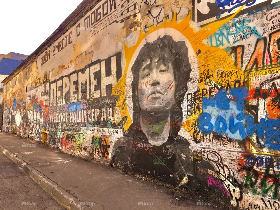 No war! Our hearts demand a change! This is Tsoi’s wall. Victor Tsoy was a Soviet rock singer of the 1980s, leader of the group “Kino”. His songs were protest and revolutionary. His work is relevant at all times, and now especially. 