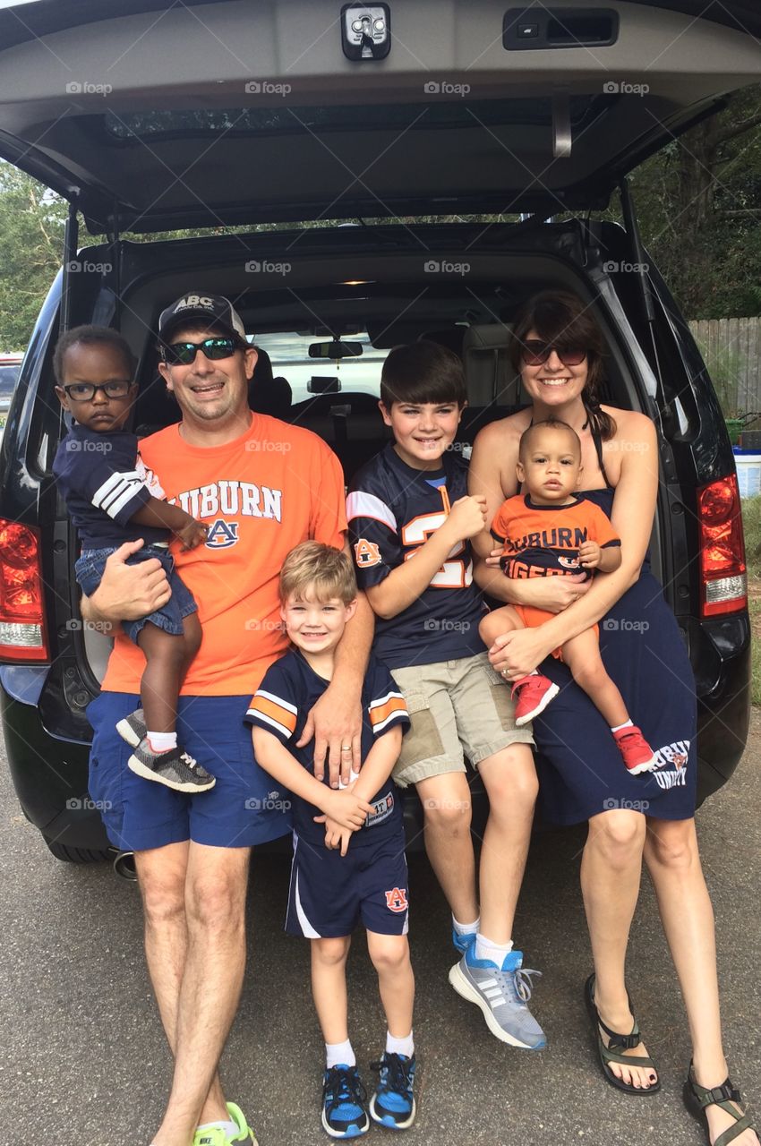 A little fun before the game for these Auburn fans tailgating. This sweet family is a beautiful image of what it means to be Auburn Tigers! War Eagle!