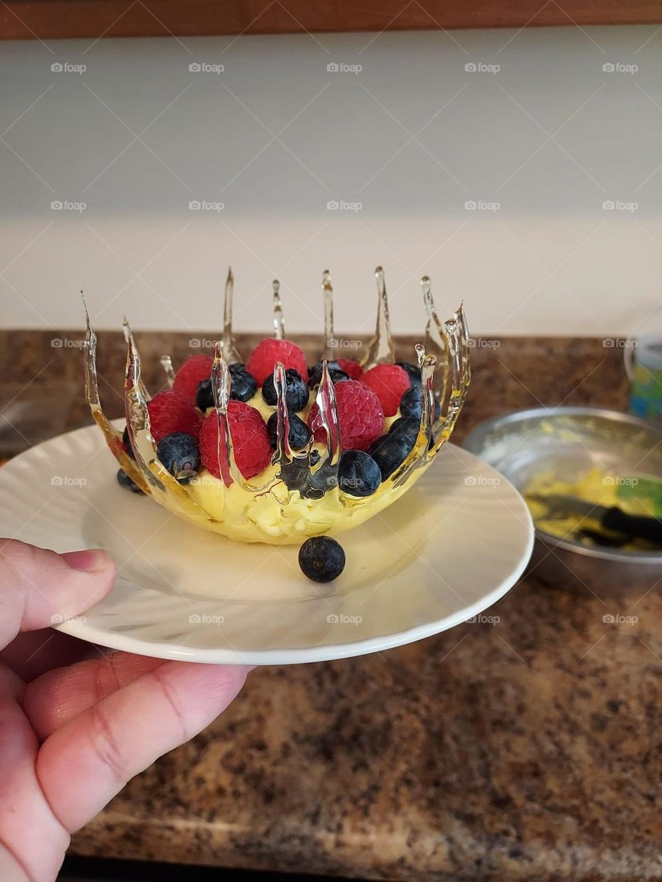 Something sweet and fresh made from the heart! I made a sugar bowl and inside is lemon cheesecake mousse topped with fresh blueberries and raspberries.