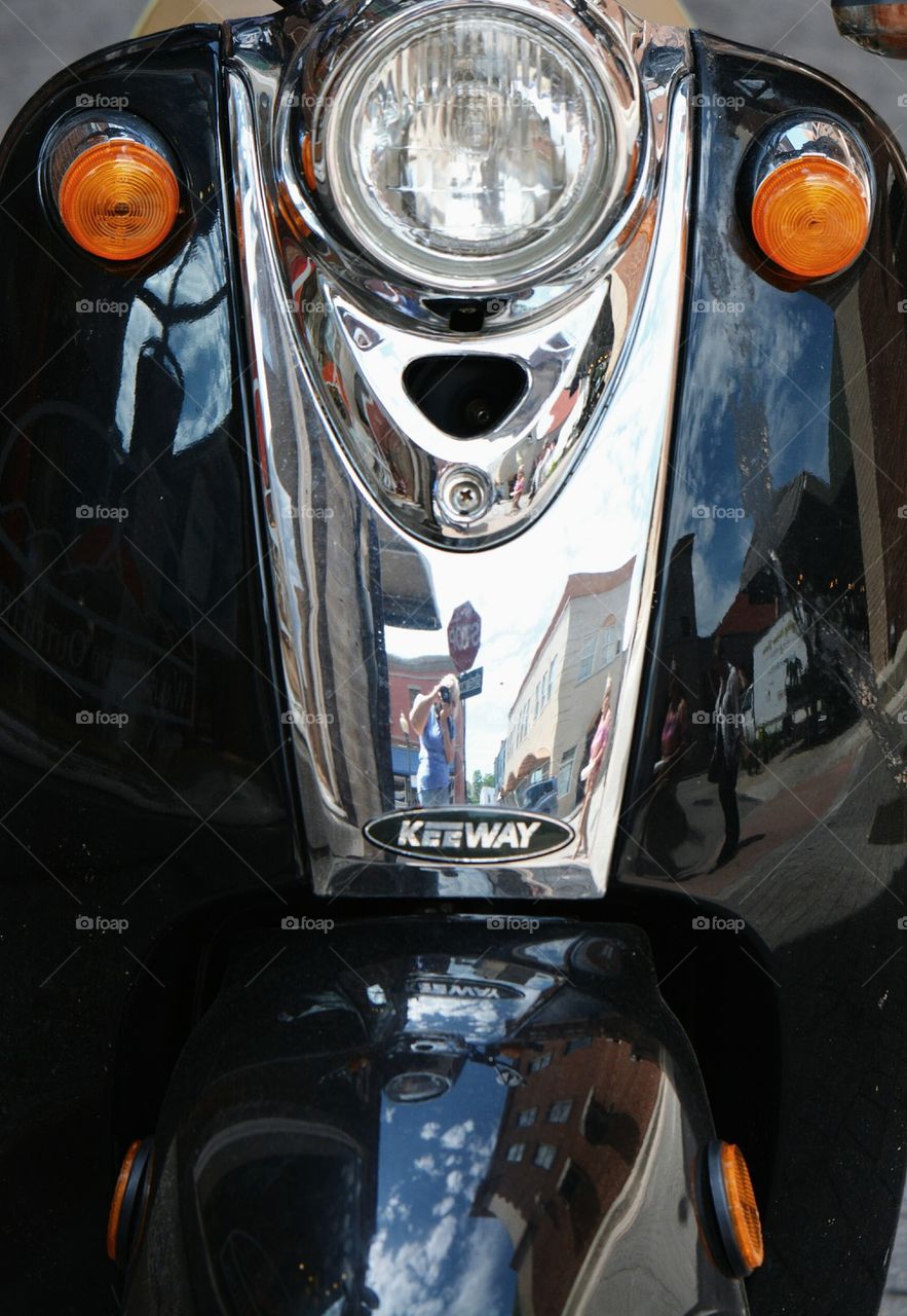 reflections in a scooter