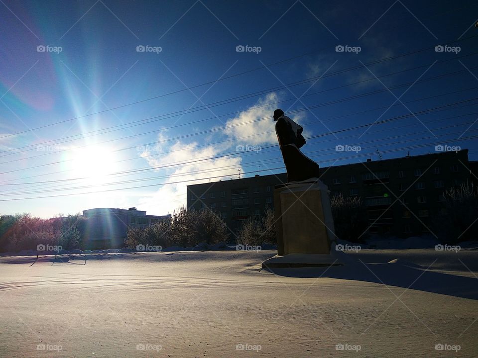 Winter landscape with Lenin monument