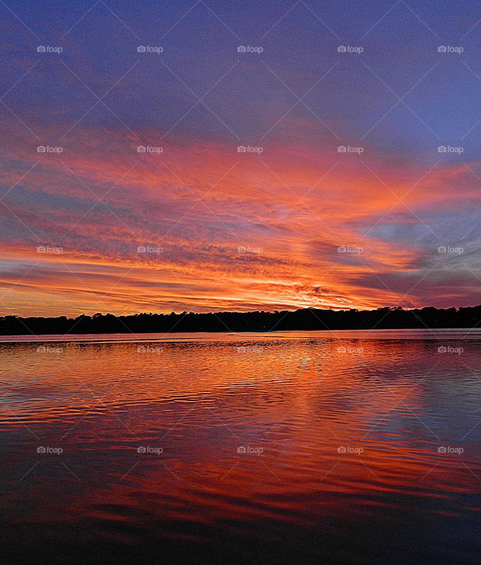 
Magnificent sight - Crimson, amber, blue and tangerine beams were thrown into the dusty sky, its beautiful colors embracing the heavens gracefully. 