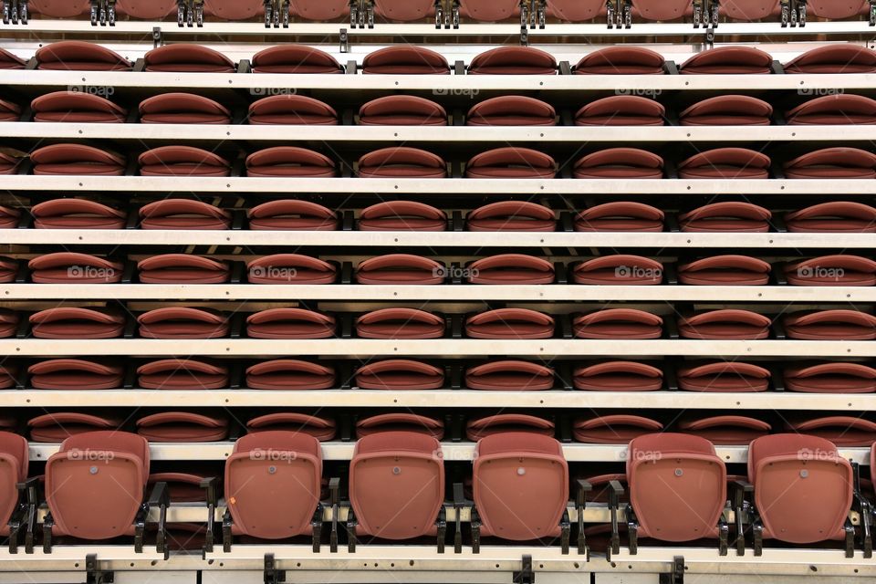 Seats or lips?. Indoor volleyball folding seats caught my as if each seat was lips giving a kiss! 