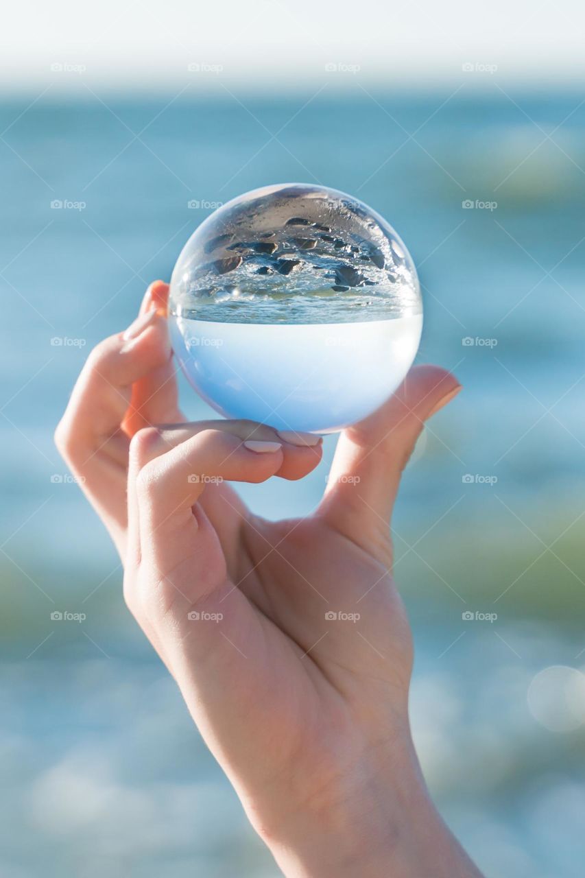 glass ball in hand