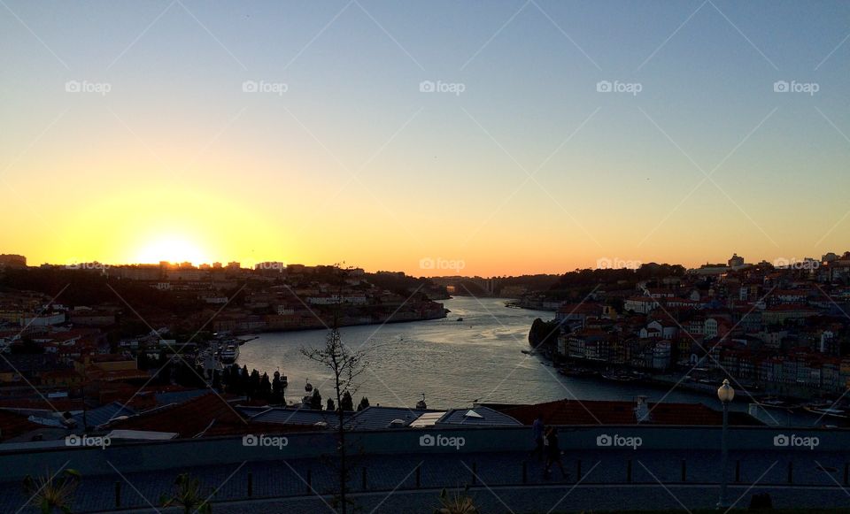 Sunset by the Douro river from Oporto bridge 