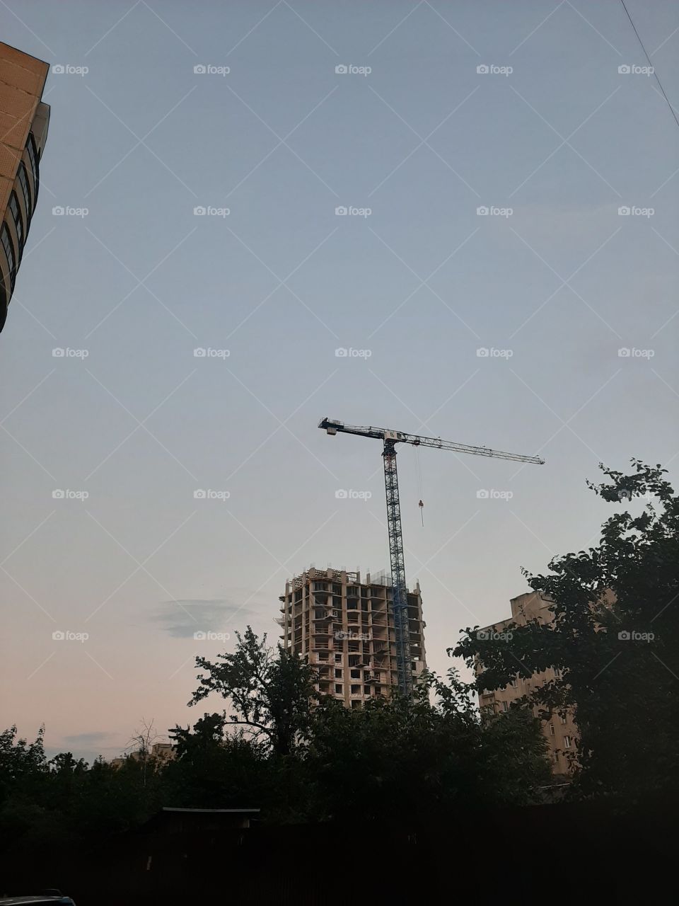 crane and multi-storey building