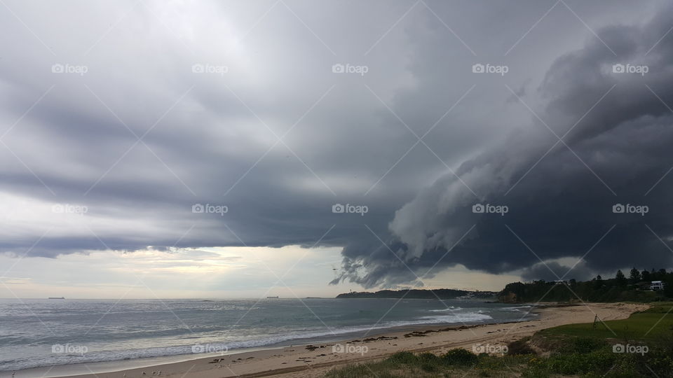 storm coastal cloud cover over ocean