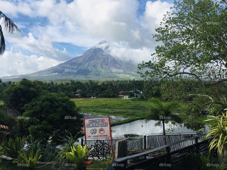 clouds touching the tip of Mayon Volcano