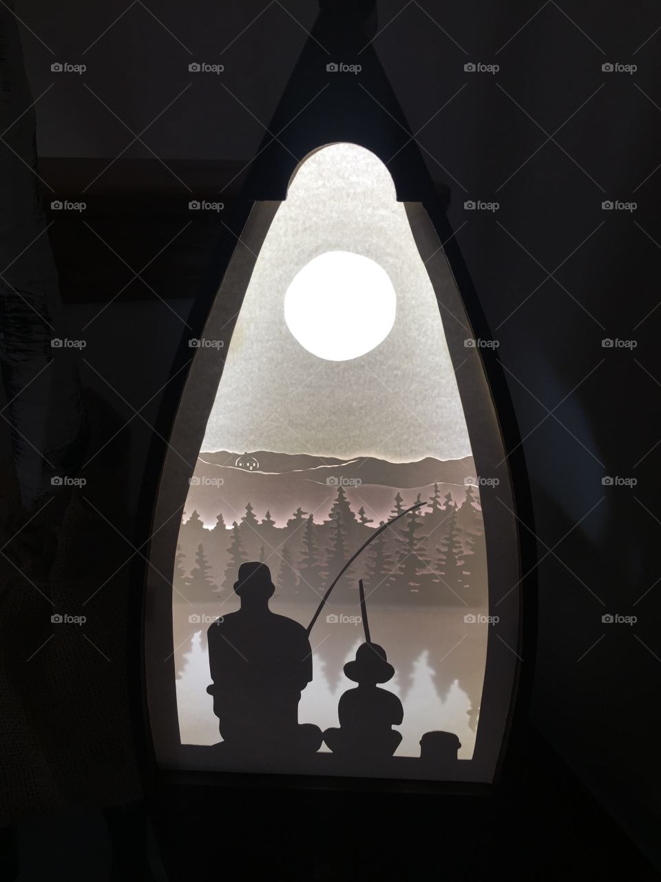 Father and child fishing on the lake light box