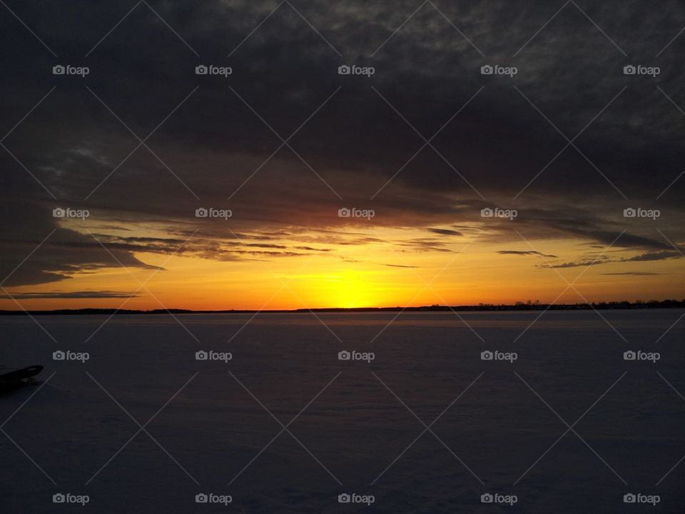 grayness of the day and dim the sun