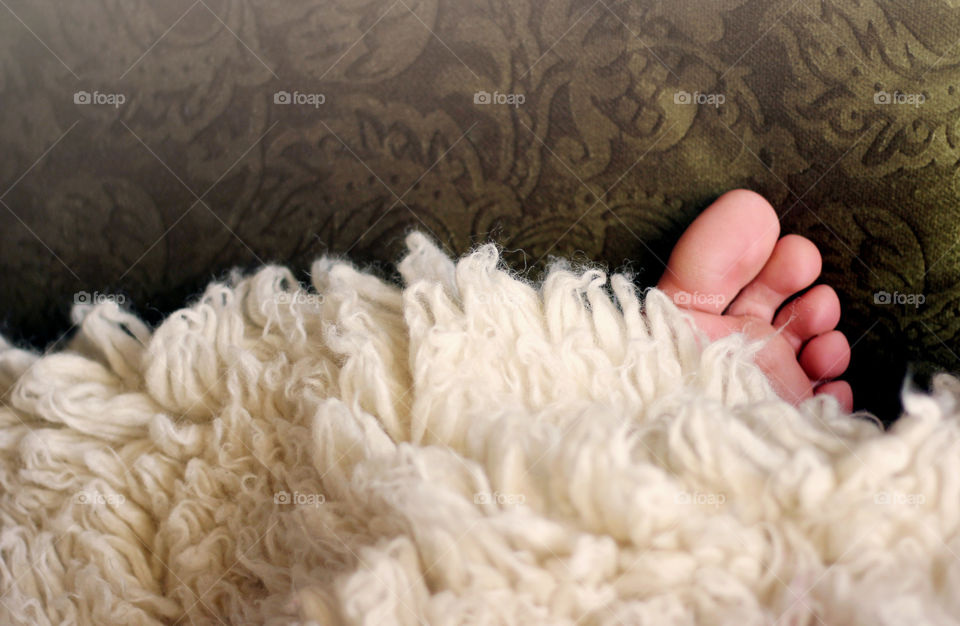 Cozy time at home, sleeping person, bare foot