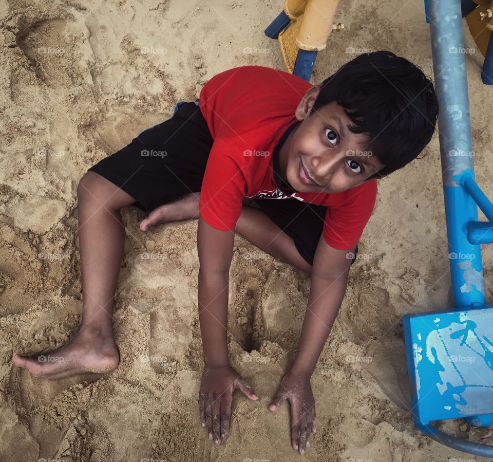 Kids from India, playing in the sand