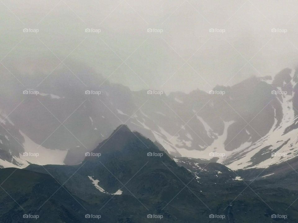 Mid June snowing on peaks