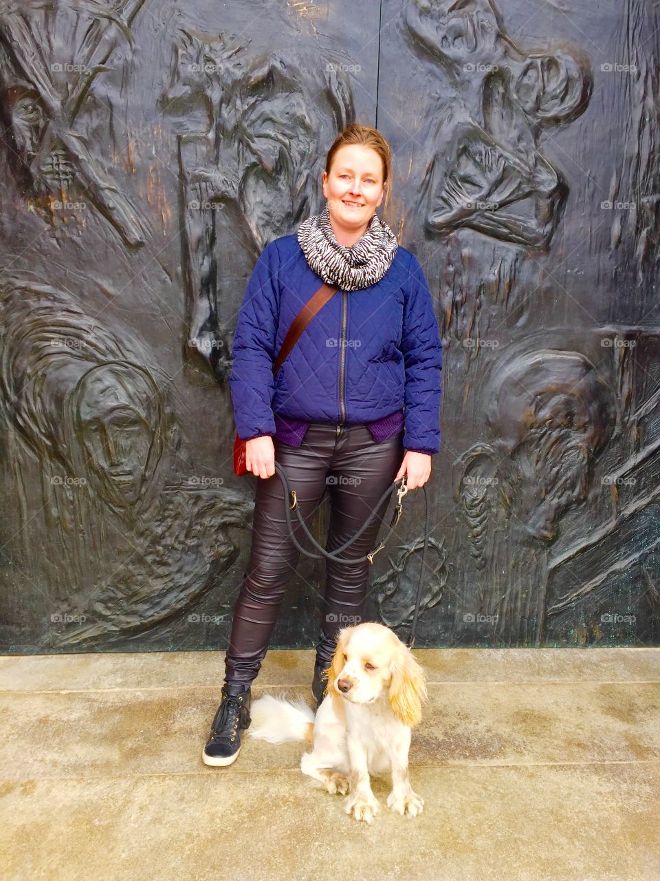 Woman standing with her dog