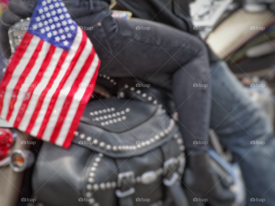 American Motorcycle Biker. Couple Riding On A Harley Davidson Motorcycle
