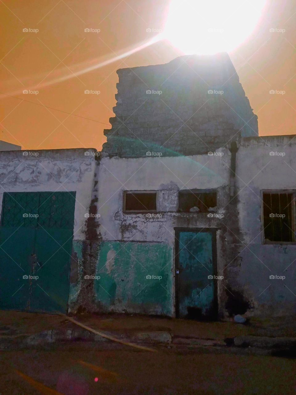 Sun shining on ancien building