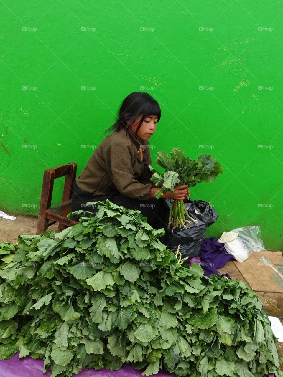 Lady selling greens