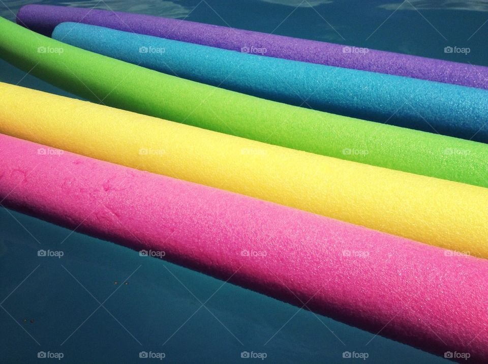 Colorful pool noodles. 