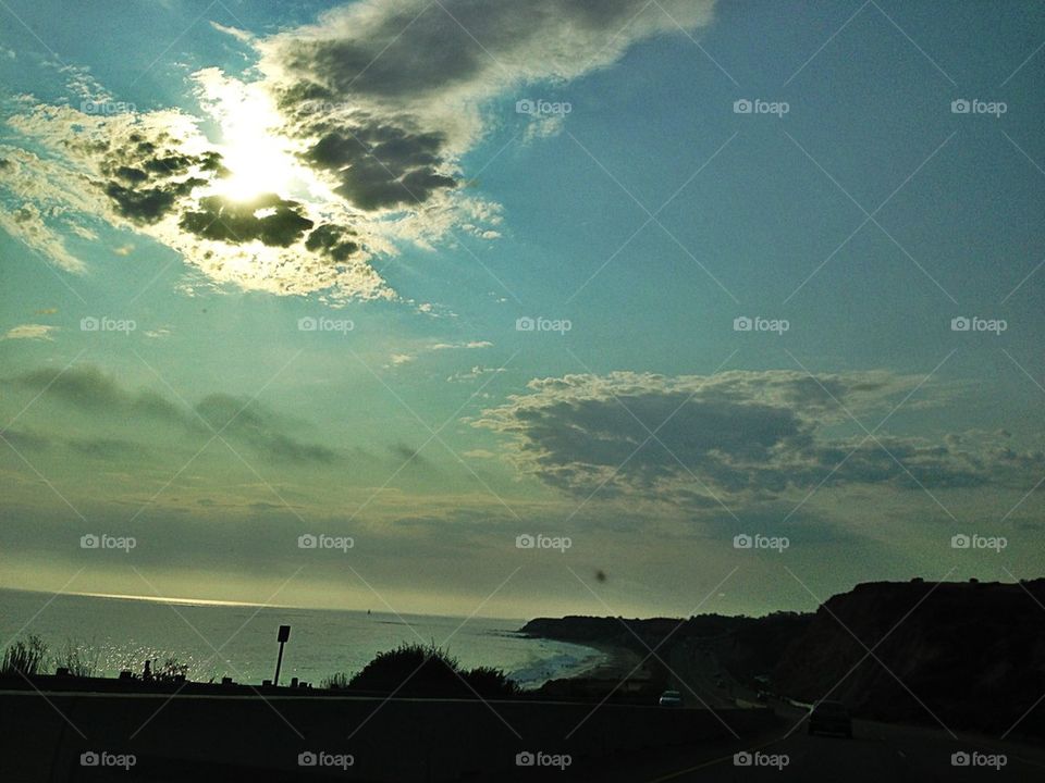 beach sky clouds road by itsAus