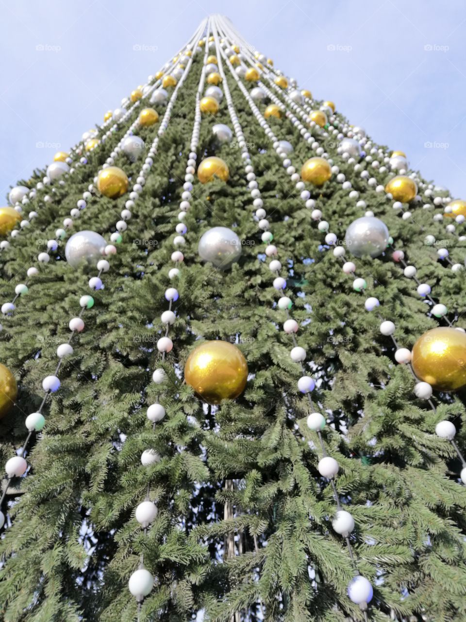 Christmas tree decorated with balls and beads