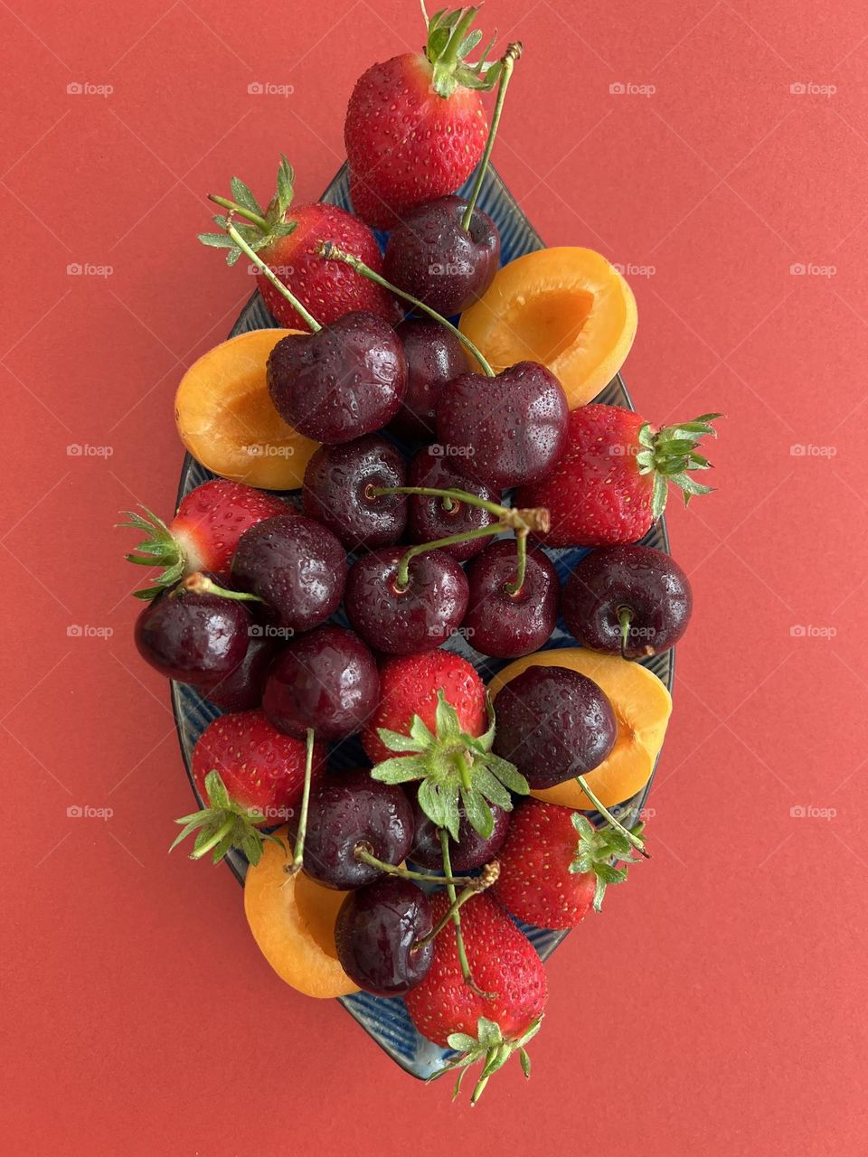Summer treats, summer time, summer mood. Tasty summer berries and apricot. Refreshing snacks.