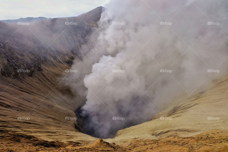 Smoke Emitting From Volcano Crater
