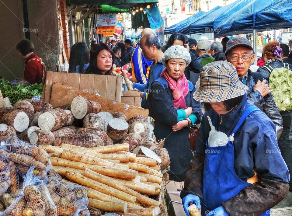 Crowded Chinese Street Market. Shopping For Vegetables In A Crowded Chinese Street Market
