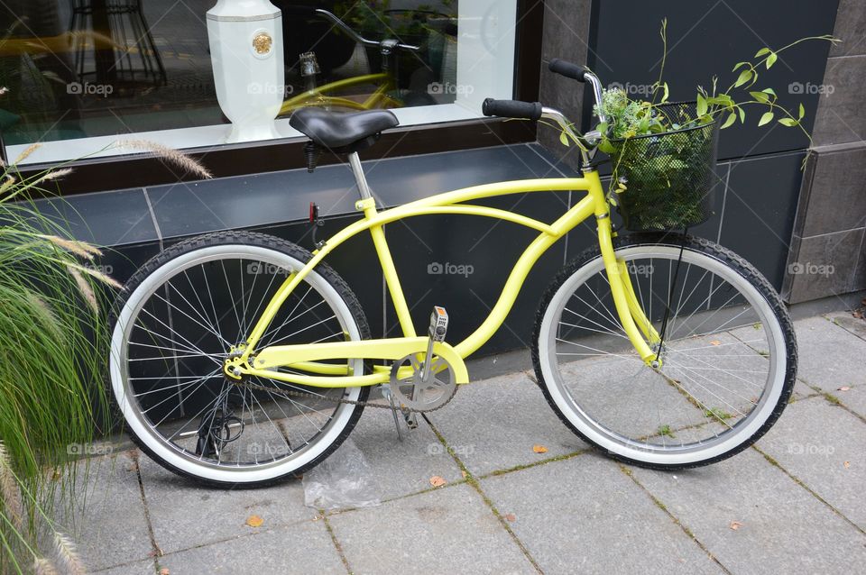 Yellow bike in street