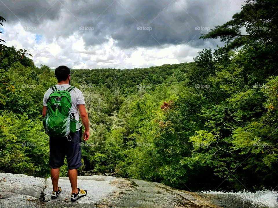 Friend of mine on top of Greenland falls at the Panthertown trails in SC