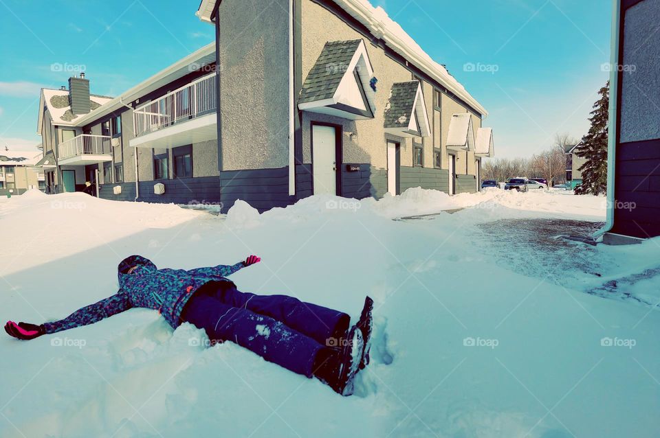 playing outside with the snow in spring