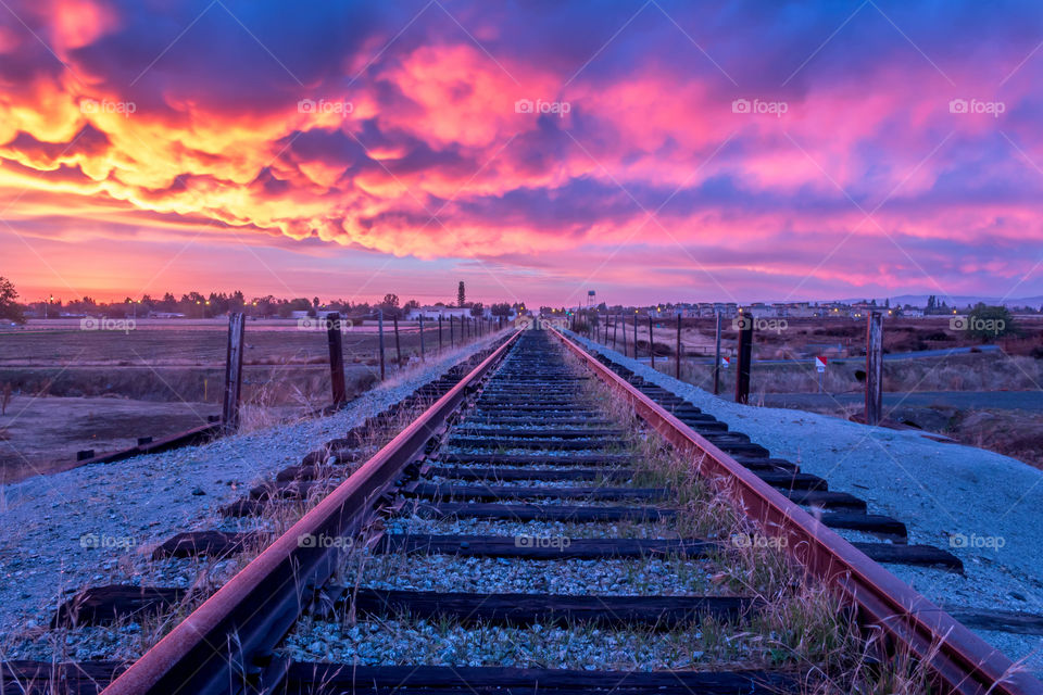 Dramatic sunset over railroad

