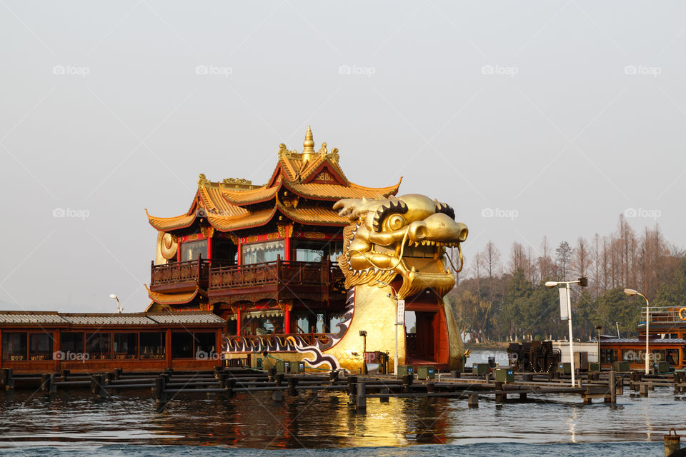 Traditional Chinese dragon boat on West lake, Hangzhou