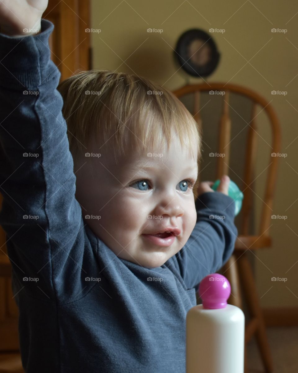 Cute baby boy playing 