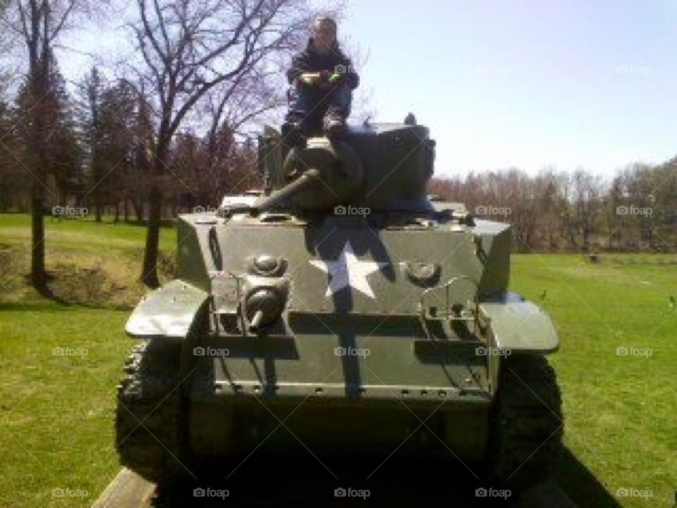 Sitting on a Tank