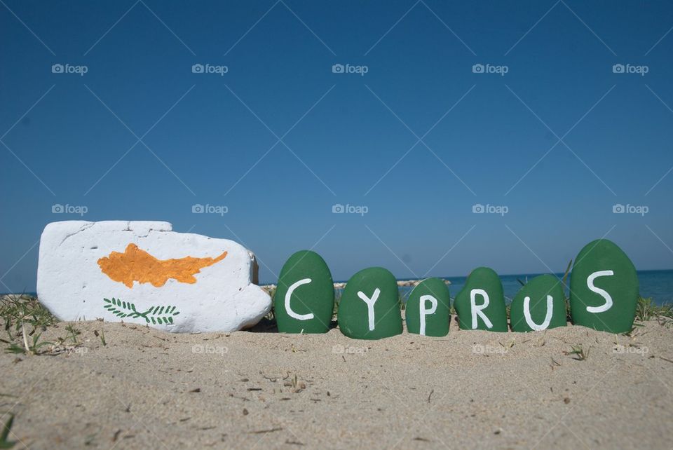 Love Cyprus, love declaration with colourful stones on the sand