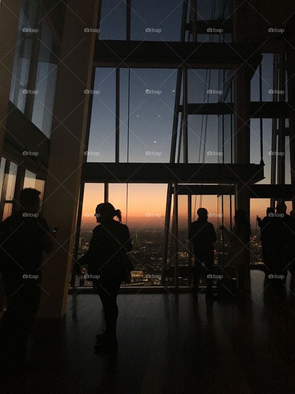 Silhouettes in the Shard. Sunsetting around London with nightfall creeping with. 