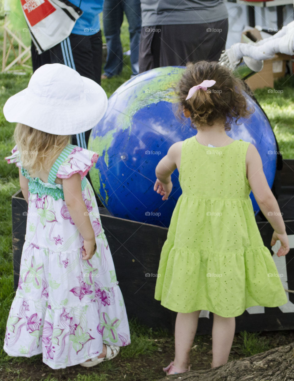 spring time fun. little girls enjoying spring