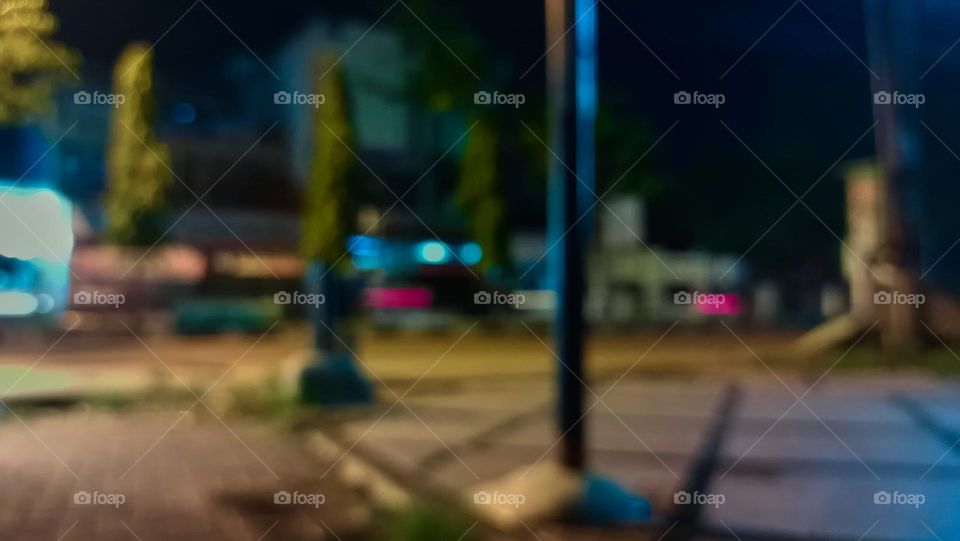 Defocused abstract background of city
street at night with street lamp lighting.
Blurred cityscape,Lighting
night at tourist attraction colorful.