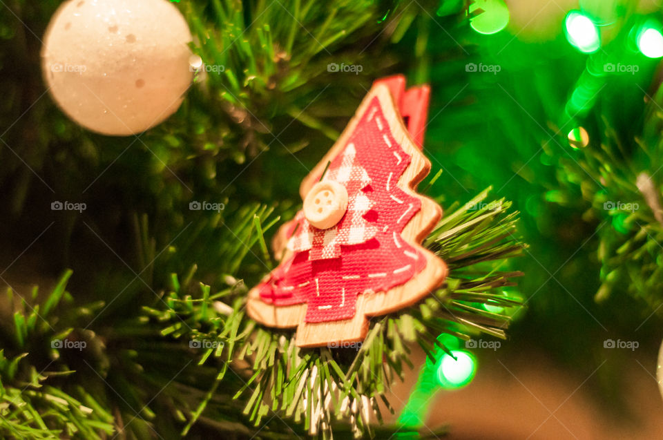 Red wooden Christmas tree as a decor 